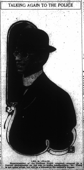 Leo M. Frank. Superintendent of the National Pencil company, snapped by a Journal photographer on the way to police headquarters. Mr. Frank is not under arrest, but will be a witness at the coroner's inquest.