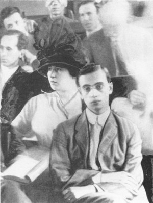 Leo Frank in the courtroom; his wife Lucille Frank behind him